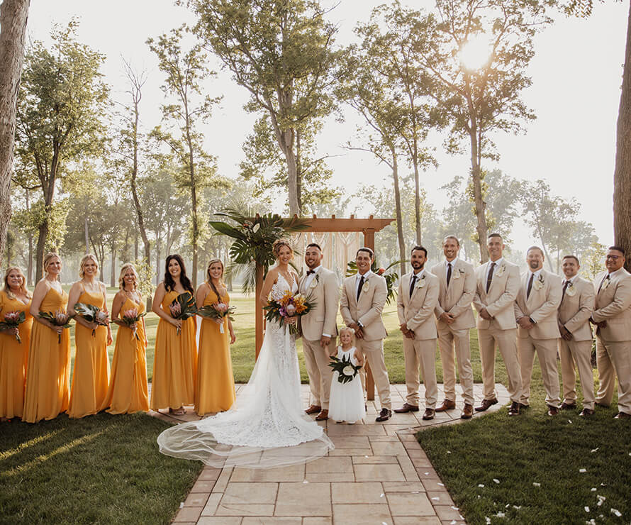 Wedding Party gathered outdoors